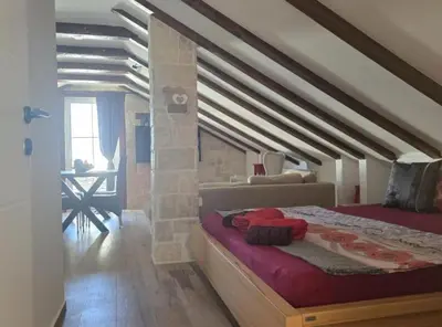 Krevet ili kreveti u jedinici u objektu Apartmani Angir Martina