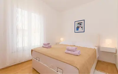 Krevet ili kreveti u jedinici u objektu Cozy Apartment In Pirovac With Lake View