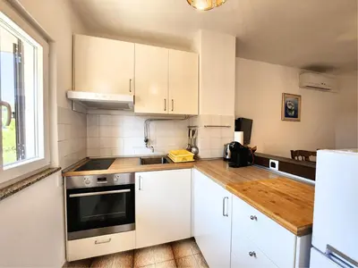 Kuhinja ili čajna kuhinja u objektu Apartment Mirka