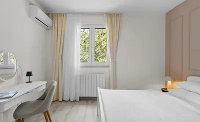 Krevet ili kreveti u jedinici u objektu Seaview Villa Ana – A Luxurious Escape Featuring a Private Pool, 6 Bedrooms, Spa Zone, and Just 450m from the Beach