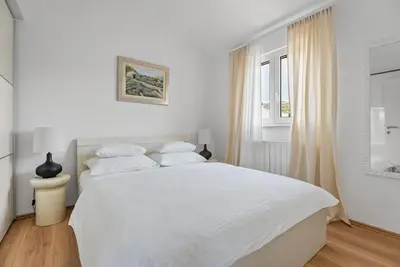 Krevet ili kreveti u jedinici u objektu Seaview Villa Ana – A Luxurious Escape Featuring a Private Pool, 6 Bedrooms, Spa Zone, and Just 450m from the Beach
