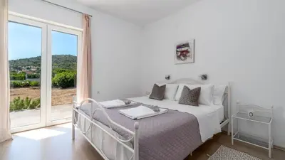 Krevet ili kreveti u jedinici u objektu Holiday home Silvija by Villas Guide