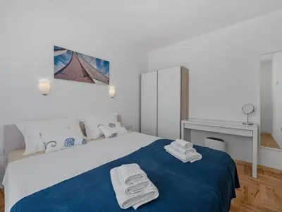 Krevet ili kreveti u jedinici u objektu Two Bedroom Apartment With Terrace And Sea View Adriatica