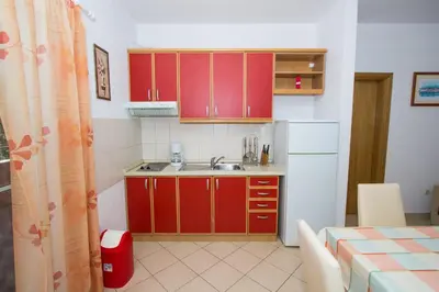 Kuhinja ili čajna kuhinja u objektu Apartments and Rooms Skalinada