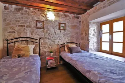 Krevet ili kreveti u jedinici u objektu Downtown stone house