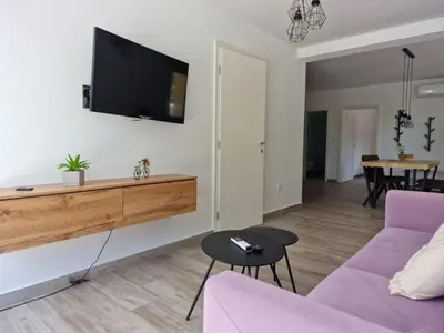 TV i/ili zabavni centar u objektu Holiday Home Großes Ferienhaus zur alleinigen Nutzung mit Pool by Interhome