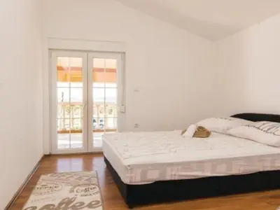 Krevet ili kreveti u jedinici u objektu Apartment Laura mit Pool by Interhome