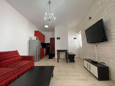TV i/ili zabavni centar u objektu Apartment Merlyn by Interhome