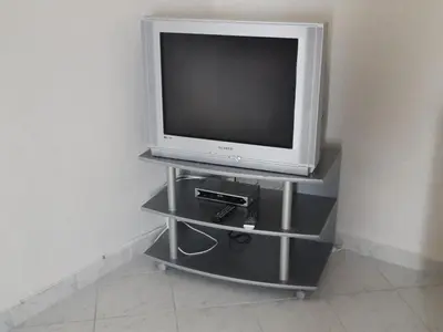 TV i/ili zabavni centar u objektu Holiday Home Sunara mit Terrasse und Kinderpool by Interhome