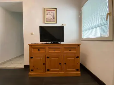 TV i/ili zabavni centar u objektu Apartment Harrison by Interhome