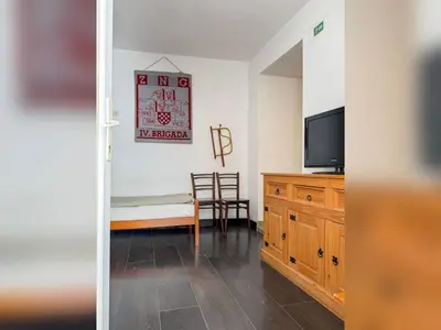 TV i/ili zabavni centar u objektu Apartment Harrison by Interhome