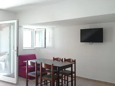 TV i/ili zabavni centar u objektu Apartment Gemütliche Ferienwohnung Emil by Interhome