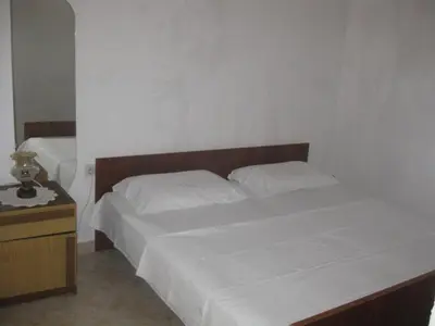 Krevet ili kreveti u jedinici u objektu Apartment Apartment mit Terrasse direkt am Meer by Interhome