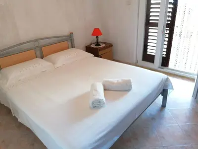 Krevet ili kreveti u jedinici u objektu Apartment Apartment direkt am Meer mit Anlegeplatz by Interhome