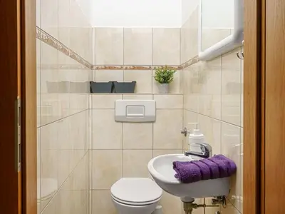 Kupaonica u objektu Apartment A4b by Interhome