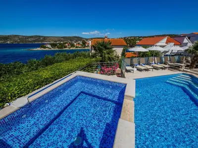 Bazen u objektu Holiday Home Strandnahes Ferienhaus mit Garten in Ražanj by Interhome ili u blizini