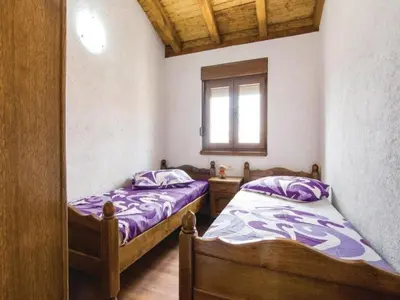 Krevet ili kreveti u jedinici u objektu Holiday Home Anita 1 mit Pool by Interhome