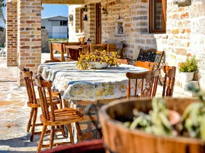 Restoran ili neka druga zalogajnica u objektu Holiday Home Anita 2 mit Pool by Interhome