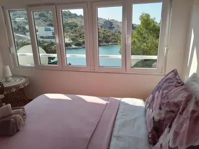 Krevet ili kreveti u jedinici u objektu Sunny apartments right by the sea