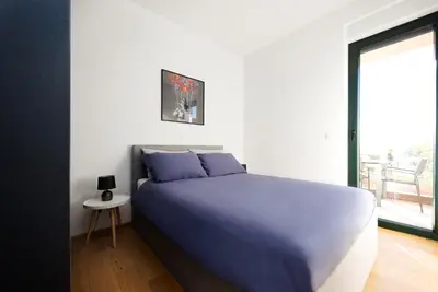 Krevet ili kreveti u jedinici u objektu Aeris Apartment