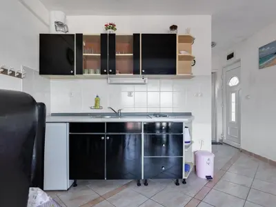 Kuhinja ili čajna kuhinja u objektu Apartment Beach Vibes-2 by Interhome