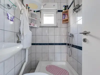 Kupaonica u objektu Apartment Beach Vibes-1 by Interhome