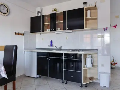 Kuhinja ili čajna kuhinja u objektu Apartment Beach Vibes-1 by Interhome