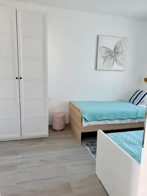 Krevet ili kreveti u jedinici u objektu Apartment Infinito, NEW modern 73m2, sea view