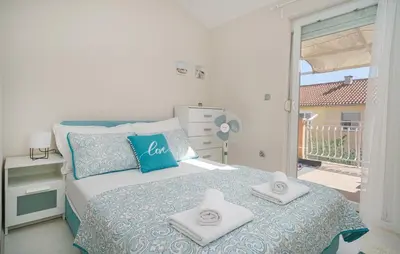 Krevet ili kreveti u jedinici u objektu Apartman Angie suit