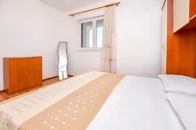 Krevet ili kreveti u jedinici u objektu Apartments Mirta