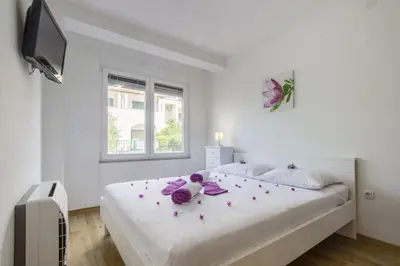 Krevet ili kreveti u jedinici u objektu Apartments Lenija