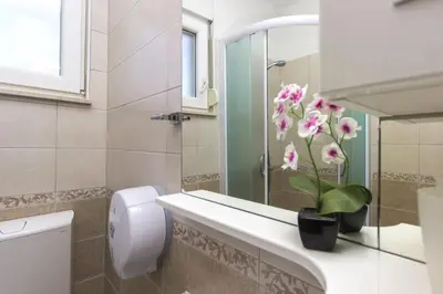 Kupaonica u objektu Apartments Lenija