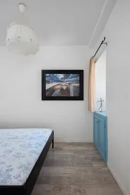 Krevet ili kreveti u jedinici u objektu Holiday Home Hanna mit Blick auf das Wasser by Interhome
