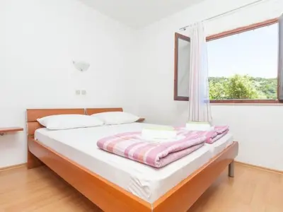 Krevet ili kreveti u jedinici u objektu Apartment Appartement mit überdachter Terrasse by Interhome