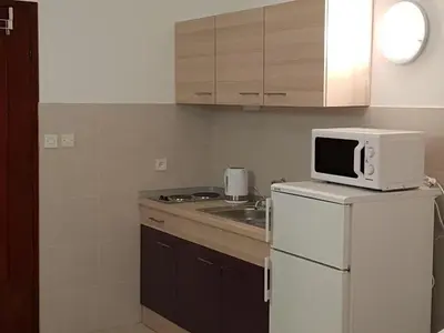Kuhinja ili čajna kuhinja u objektu Apartment Strandappartement Ana mit Meerblick- Garten- Grillplatz by Interhome