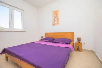 Krevet ili kreveti u jedinici u objektu Apartments Fabijan