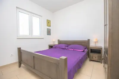 Krevet ili kreveti u jedinici u objektu Apartments Fabijan