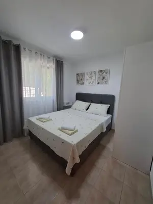 Krevet ili kreveti u jedinici u objektu Apartman J&M