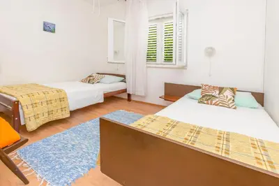 Krevet ili kreveti u jedinici u objektu Beachfront Apartments Lozica