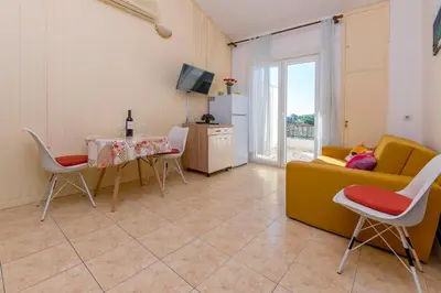TV i/ili zabavni centar u objektu Beachfront Apartments Lozica