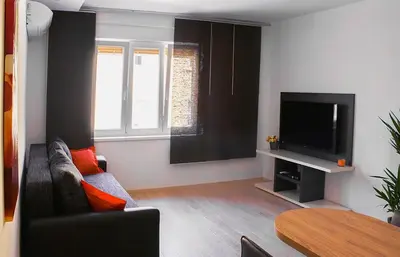 TV i/ili zabavni centar u objektu Luxurious Mediterranean Apartment NEVA
