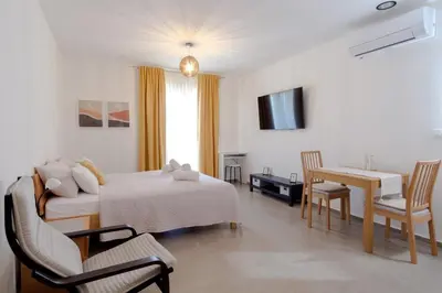 TV i/ili zabavni centar u objektu Apartment Complex 50 Meters To The Sea