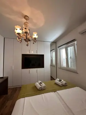 TV i/ili zabavni centar u objektu LaFamilia Apartmani Vodice