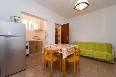 Kuhinja ili čajna kuhinja u objektu Apartment and Rooms Ive