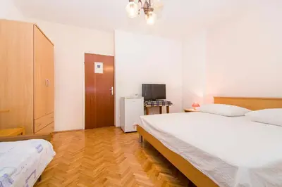 Krevet ili kreveti u jedinici u objektu Apartment and Rooms Ive