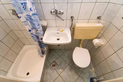 Kupaonica u objektu Apartment and Rooms Ive