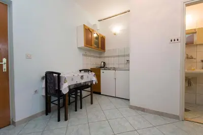 Kuhinja ili čajna kuhinja u objektu Apartment and Rooms Ive
