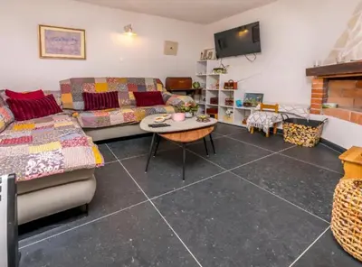 TV i/ili zabavni centar u objektu Holiday home Kuzmino