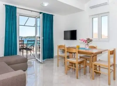 TV i/ili zabavni centar u objektu Apartments Ana