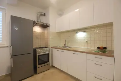 Kuhinja ili čajna kuhinja u objektu Apartment Villa Dalmacija
